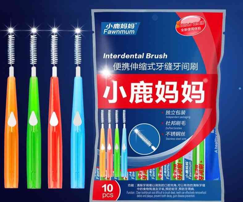 Odrasle međuzubne četkice čiste između zuba -zubni konac