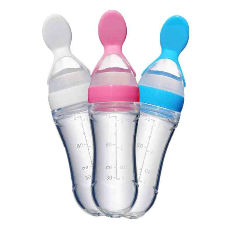 Silicone Squeezing Bottle With Attached Spoon For Feeding To Babies