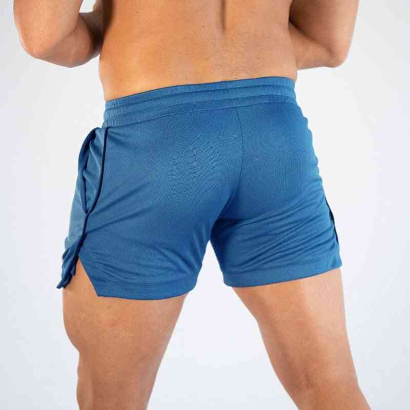 Mænd sport fitness træning hurtige tørre shorts