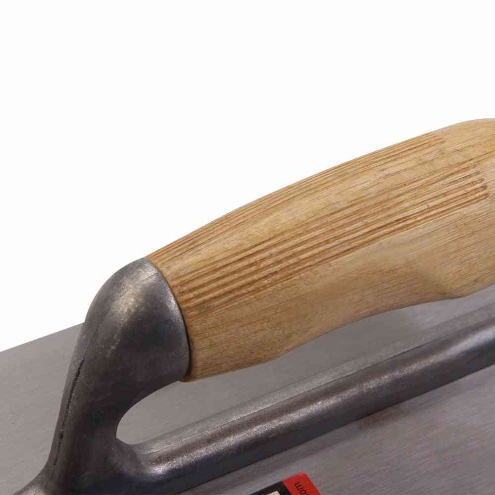 Plastering af efterbehandler af trowel-stål med træhåndtag