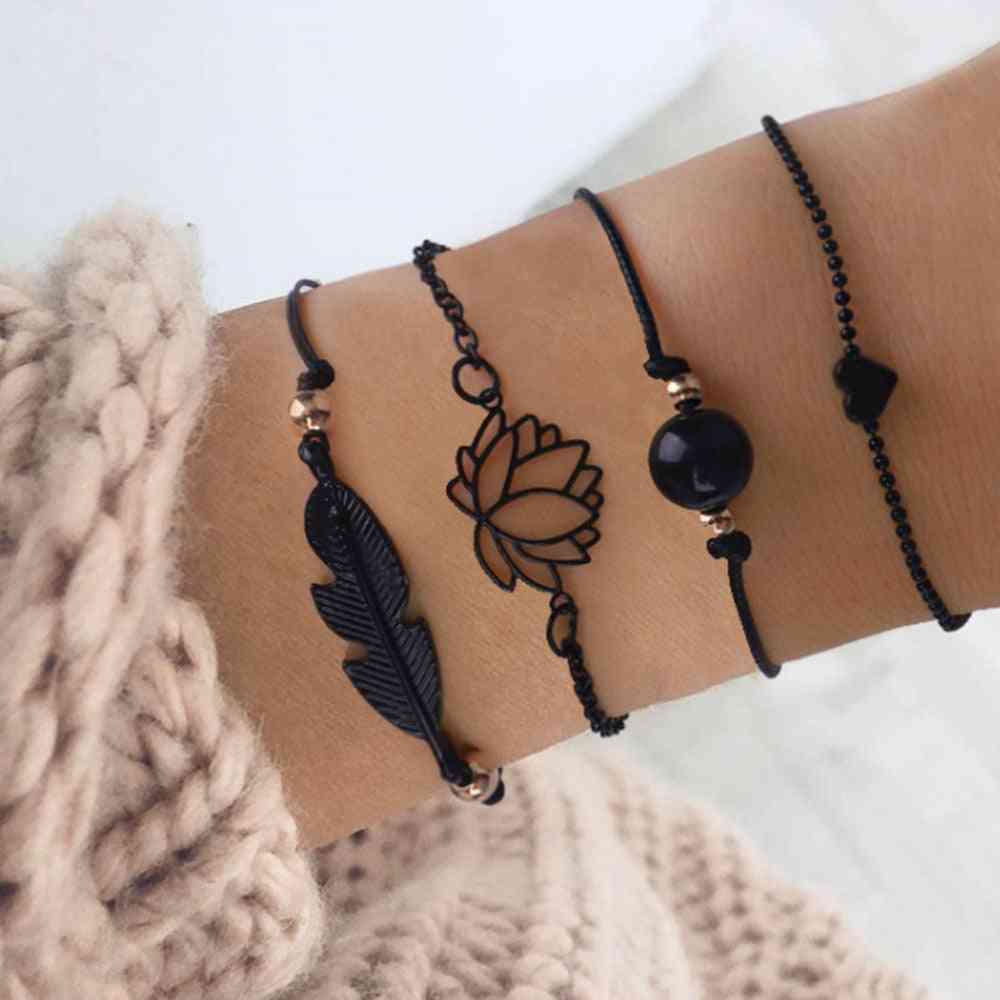 Gothic veren lotus armbanden set