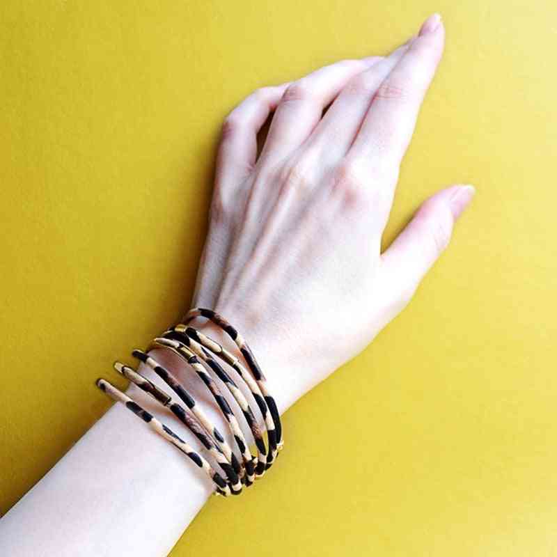élégants bracelets multicouches en cuir léopard