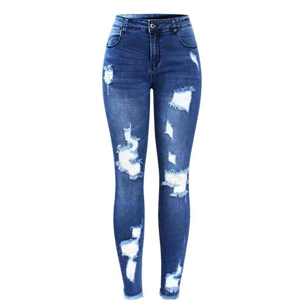 Ultra rekbare blauwe gescheurde jeans met kwastjes