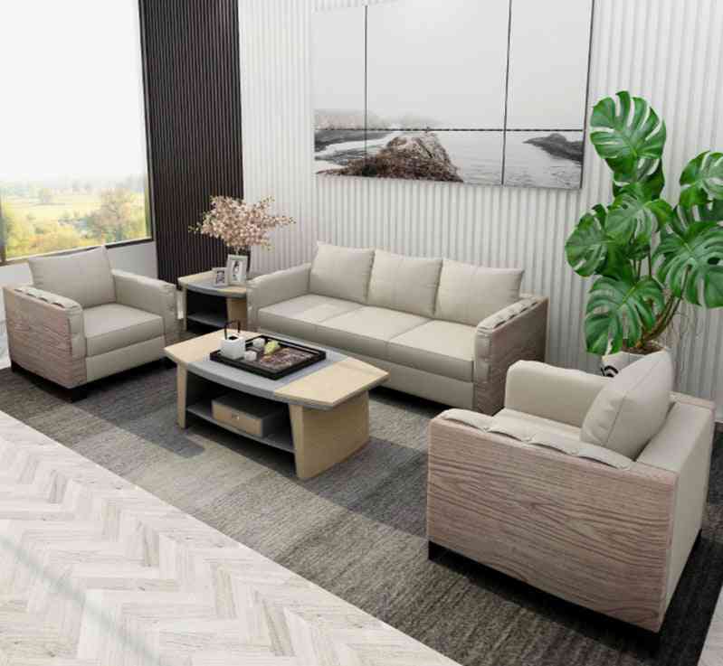 Tyylikäs moderni nahkainen iso sohva, puinen sohvapöytä toimistoon, kotiin