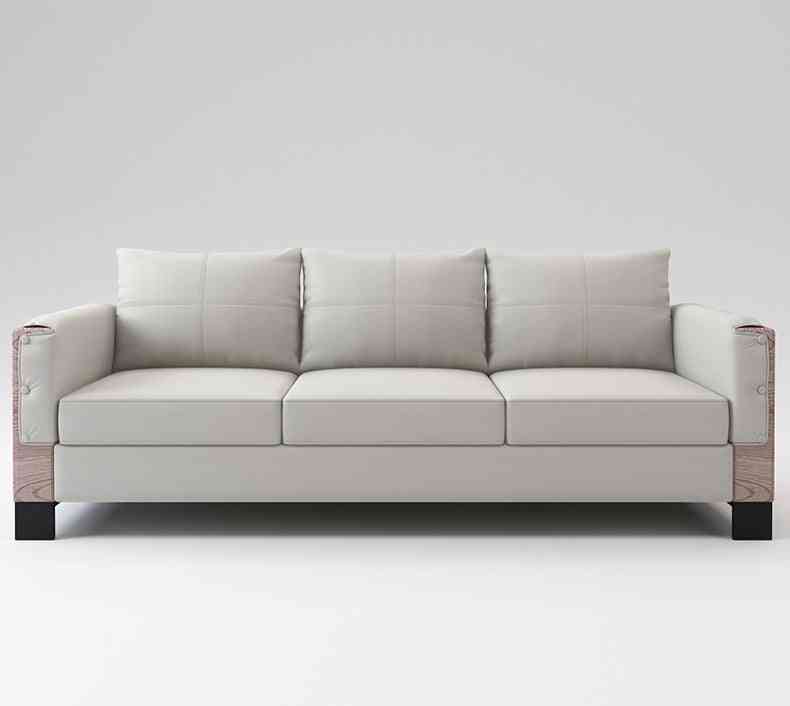 Tyylikäs moderni nahkainen iso sohva, puinen sohvapöytä toimistoon, kotiin