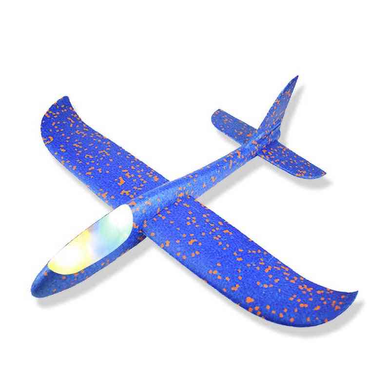Juguete modelo de avión giratorio de espuma que lanza a mano y máquina luminosa con luz