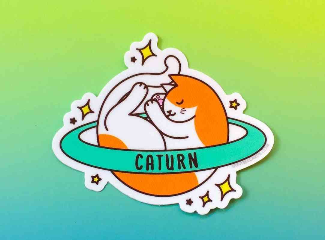 Naklejka winylowa słodki kosmiczny kot „caturn”