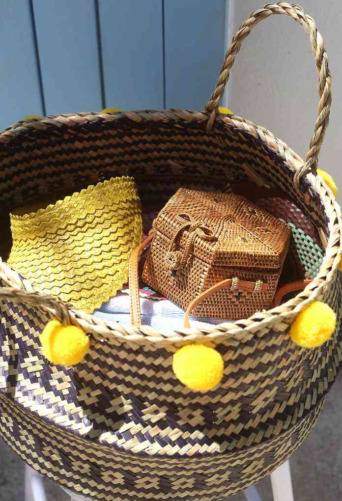 Wide Woven Straw Basket With Pom-poms