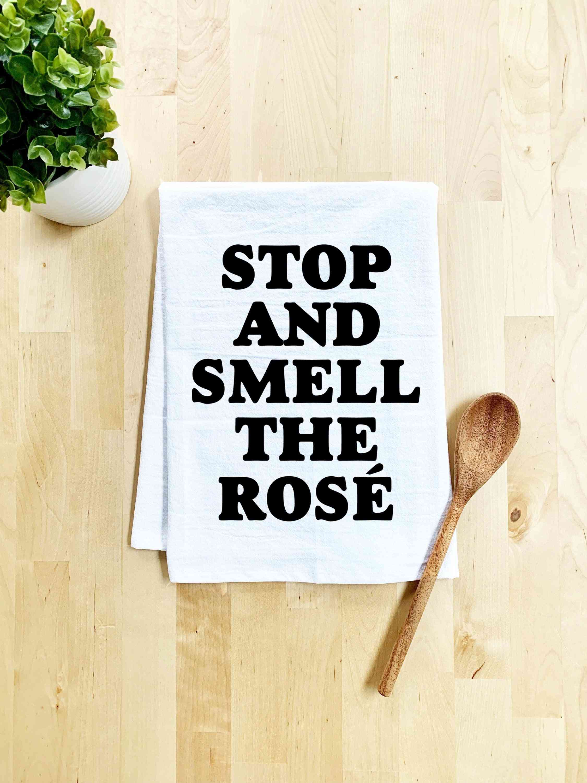 Stop en ruik de theedoek met rozenprint