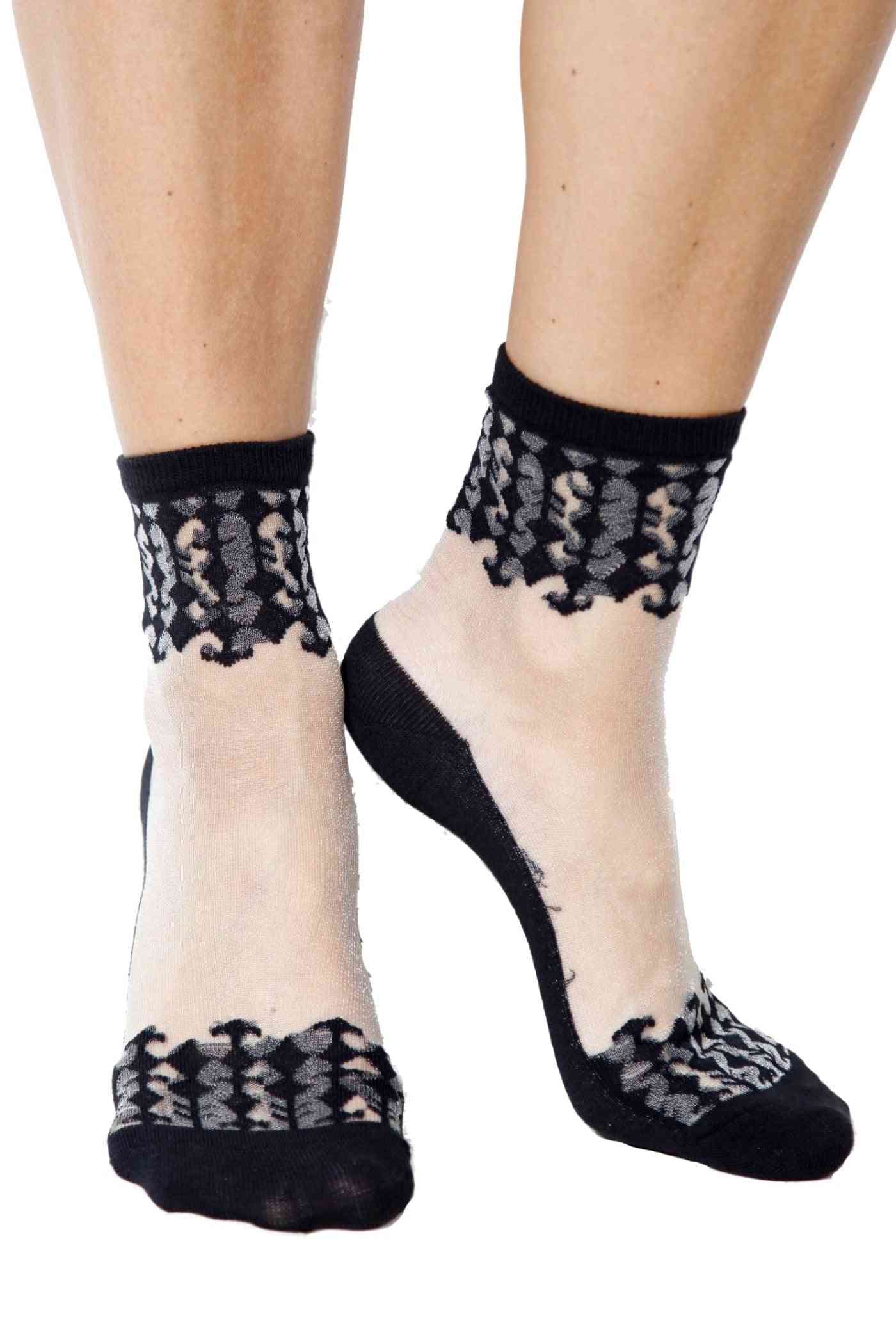 Elegantne sjajne prozirne crne čarape