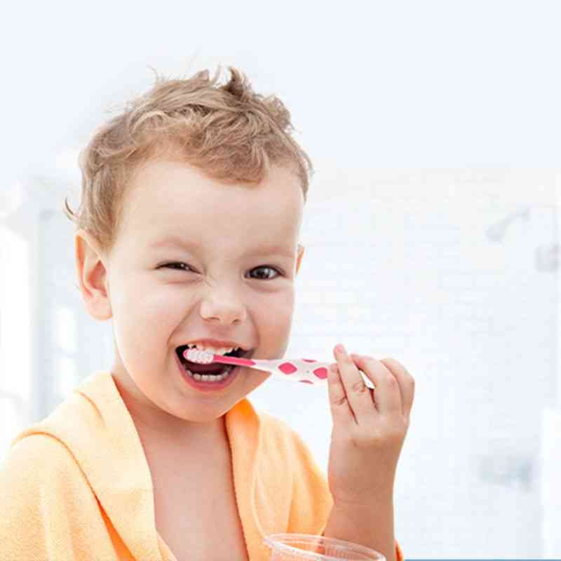 Simpatico cartone animato per la cura dei denti da latte spazzolino da denti