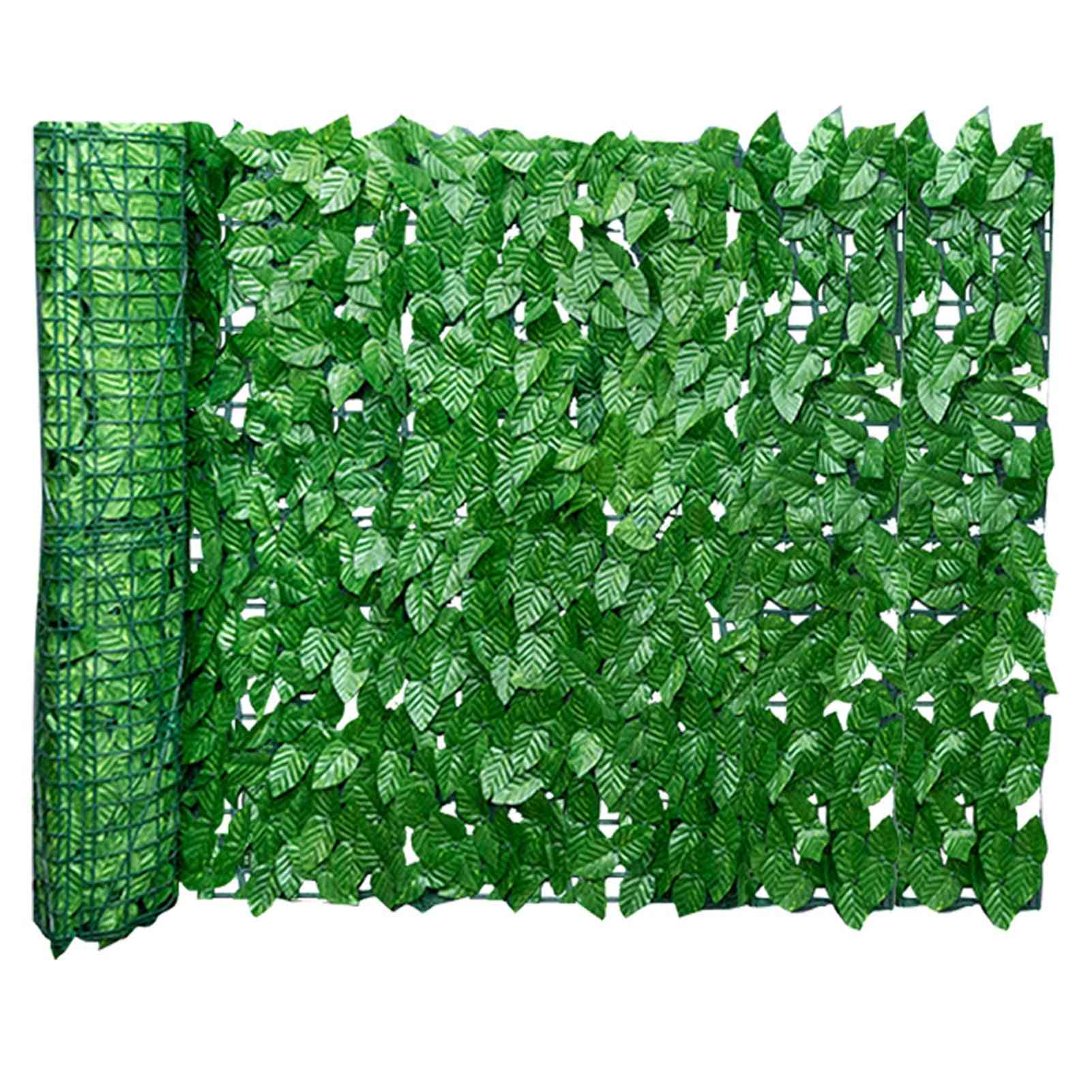 Clôture de jardin en feuilles artificielles